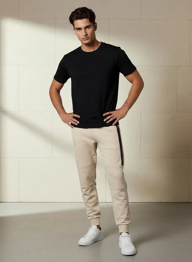 Kappa  Kappa Men Jogger with Heat Sealed Zip Pockets for Men | Best Price UAE